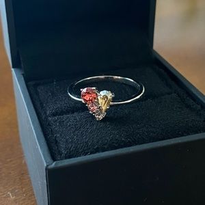 Size 9 ring with orange, yellow, pink, and rhodolite stones. Brand new NWOT